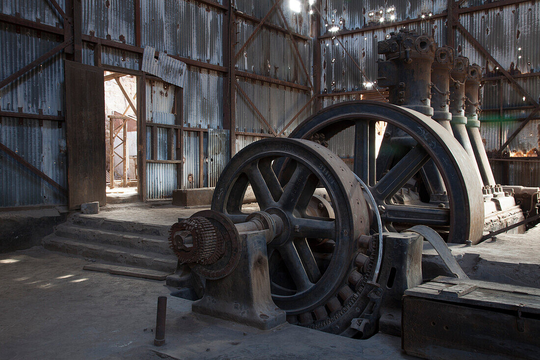 Machinery in old powerhouse of Humberstone ghost town, near Iquique, Tarapaca, Chile