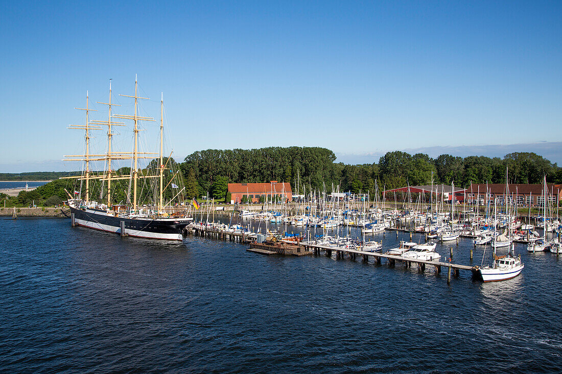 Viermastbark tall ship Passat (now a museum ship) with sailboats in Priwallhafen marina, Travemünde, Schleswig-Holstein, Germany