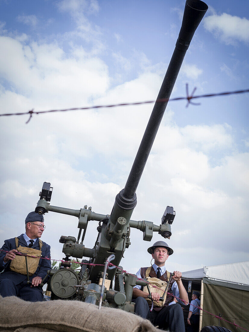 Actors with anti-aircraft gun from the Second World War, Goodwood Revival 2014, Racing Sport, Classic Car, Goodwood, Chichester, Sussex, England, Great Britain