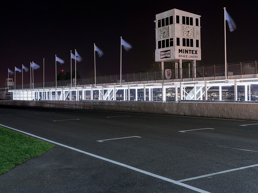 Start- finishing straight and pits at night, 72nd Members Meeting, racing, car racing, classic car, Chichester, Sussex, United Kingdom, Great Britain