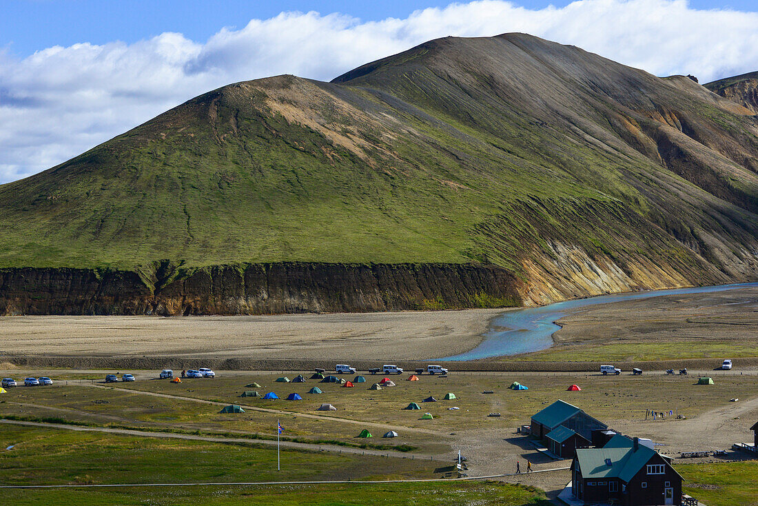 Tents and huts at camping site Brenisteinsalda at the river Landmannalaugar, Highlands, Southern Iceland, Iceland, Europe