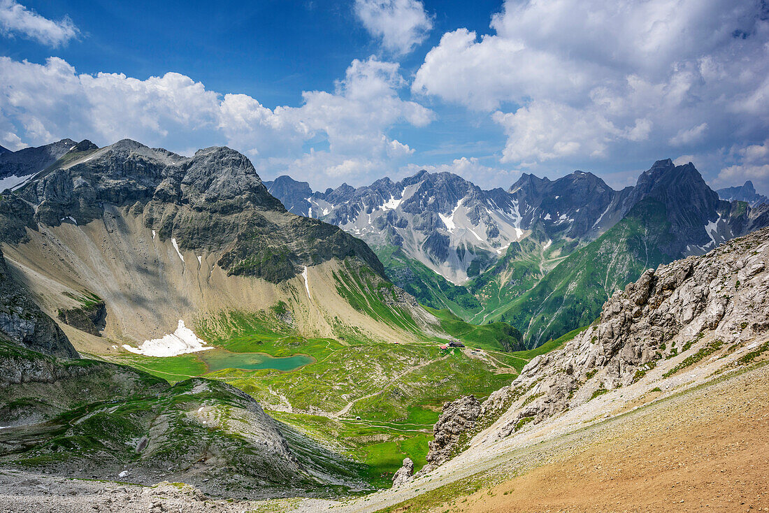 View to lake Seewisee and hut Memminger Huette with Vorderer See, Rotspitze, Freispitze and Wetterspitze, Lechtal Alps, Tyrol, Austria