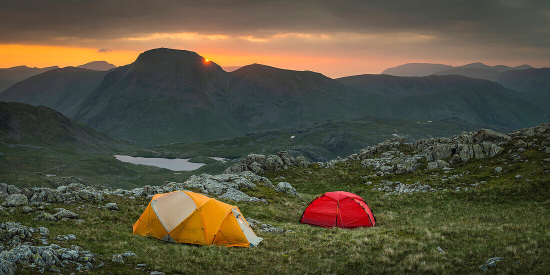 Camp tents in rocky rural landscape, Keswick, Cumbria, United Kingdom, Keswick, Cumbria, UK