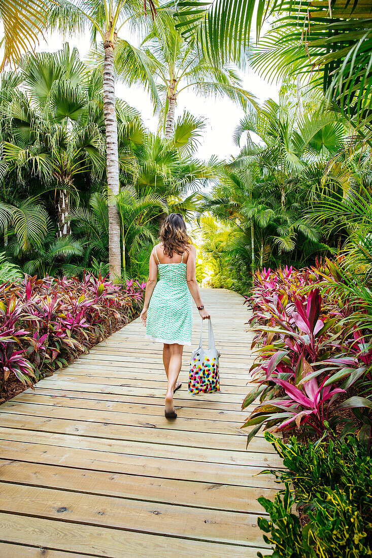 Mixed race woman on tropical walkway, Puerto Vallarta, Jalisco, Mexico