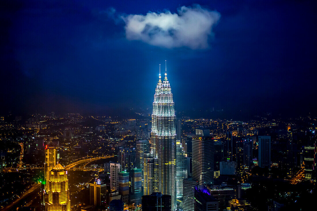 View of city skyline lit up at night, Kuala Lumpur, Malaysia, Kuala Lumpur, Federal Territory of Kuala Lumpur, Malaysia