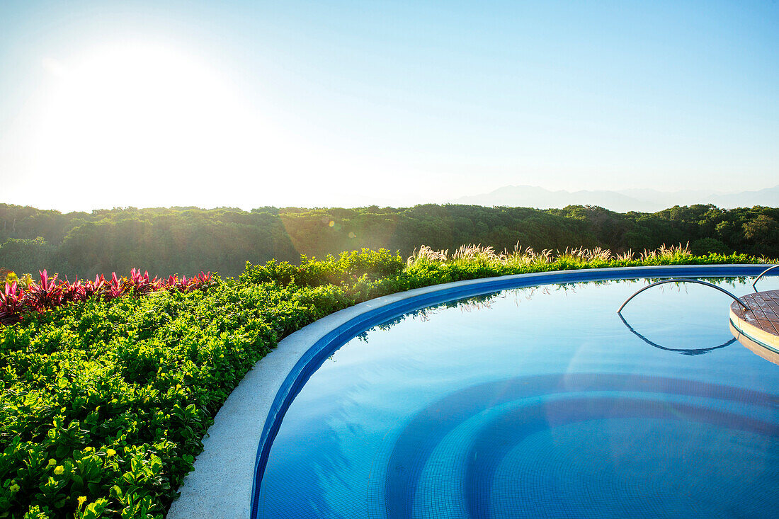 Infinity pool overlooking rural landscape, Puerto Vallarta, Jalisco, Mexico