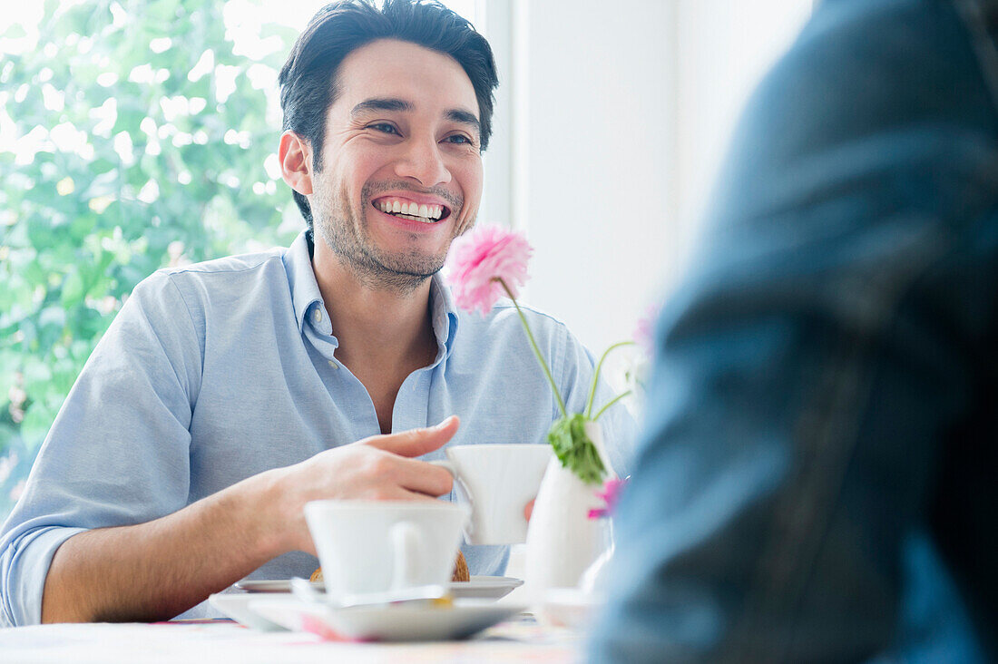 Couple eating breakfast together, Jersey City, New Jersey, USA