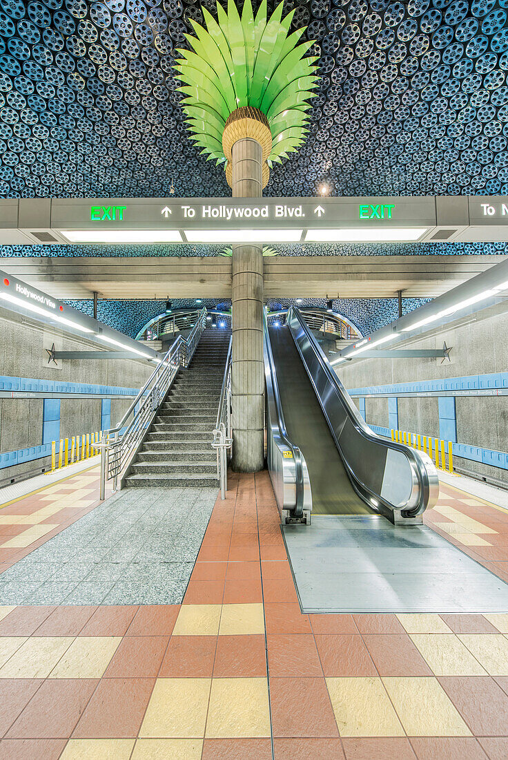 Ornate pillars, escalator and movie reels on ceiling in subway station, Los Angeles, California, United States, Los Angeles, California, USA