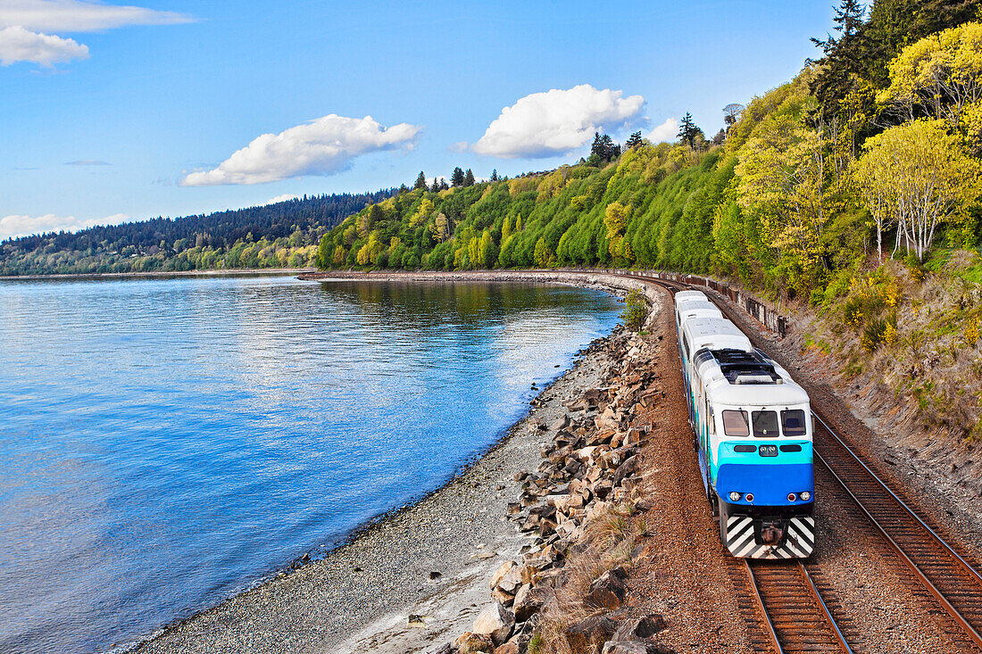 Commuter train on tracks at waterfront, C1