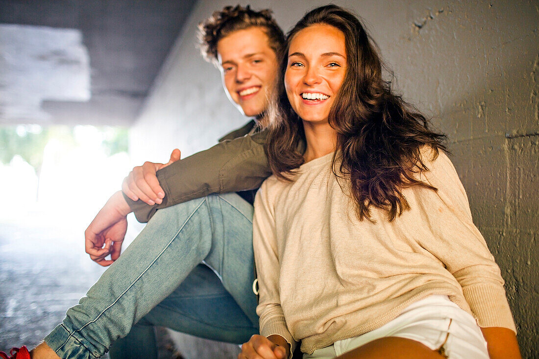 Caucasian couple smiling in tunnel, Seattle, Washington, United States