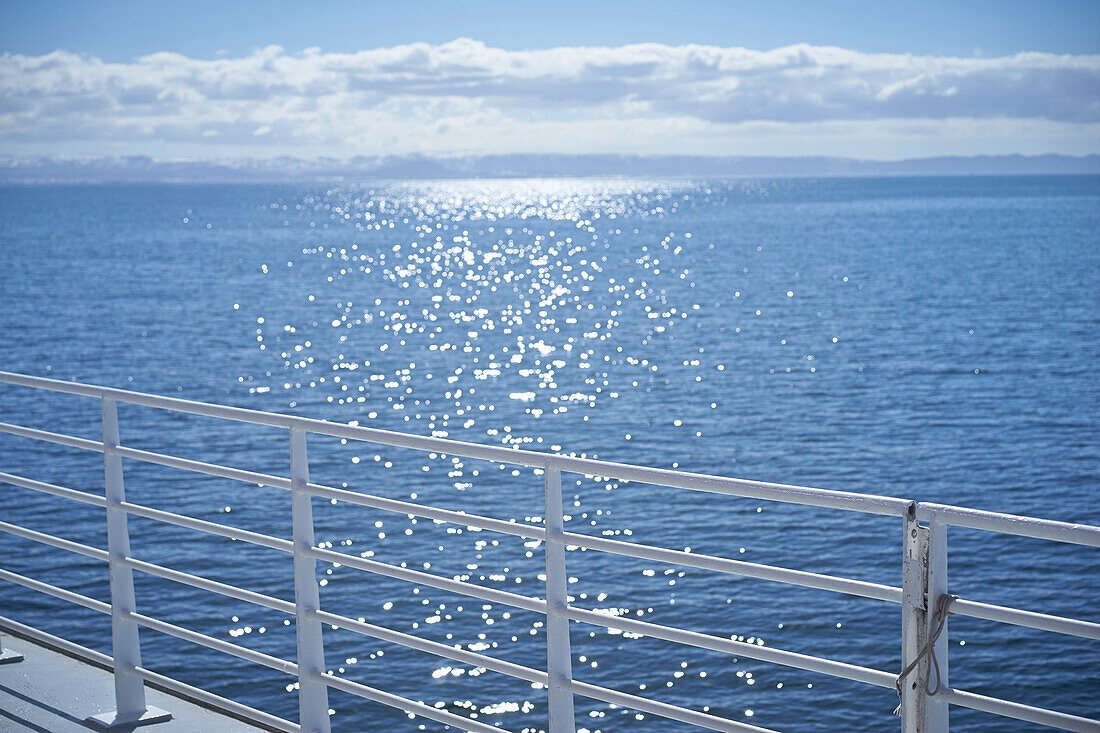 White railing overlooking seascape, unknown, unknown, Iceland