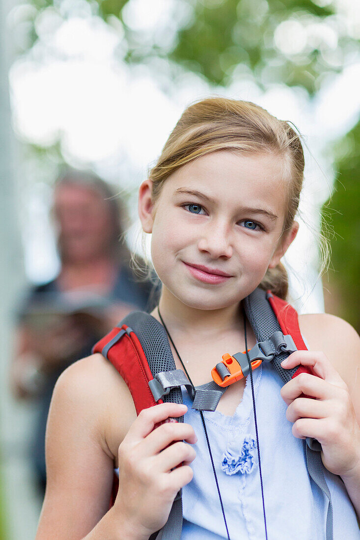 Caucasian girl hiking with backpack, Santa Fe, New Mexico, USA