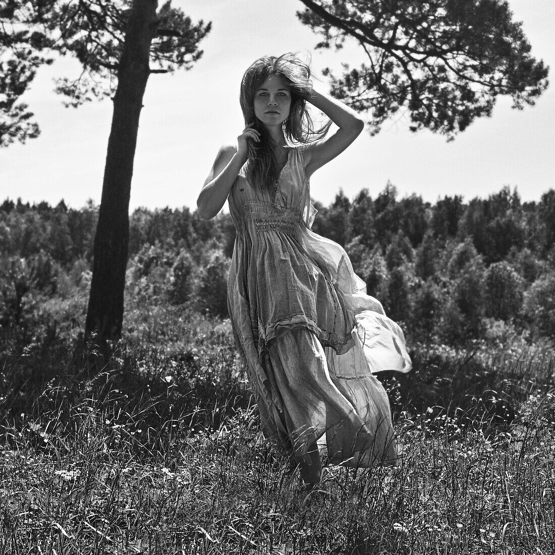 Caucasian woman walking in rural field, Nizniy Tagil, Sverdlovsk, Russia