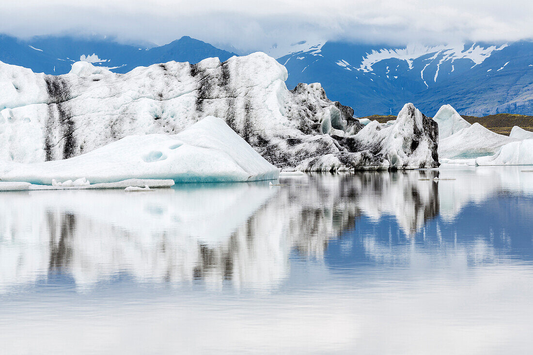 Vatnajokull Glacier reflected in still arctic water, Iceland, Vatnajokull Glacier, Iceland, Iceland