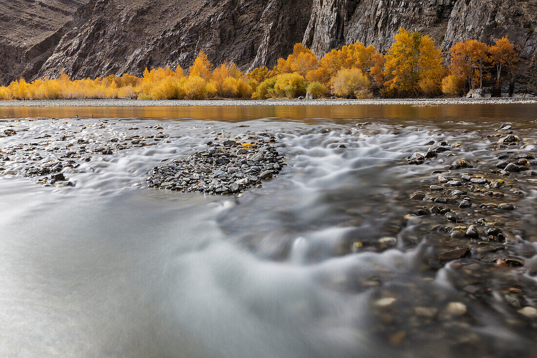 Time lapse view of river and rocky riverbed in remote landscape, Bayan Ulgii, Bayan Ulgii, Mongolia