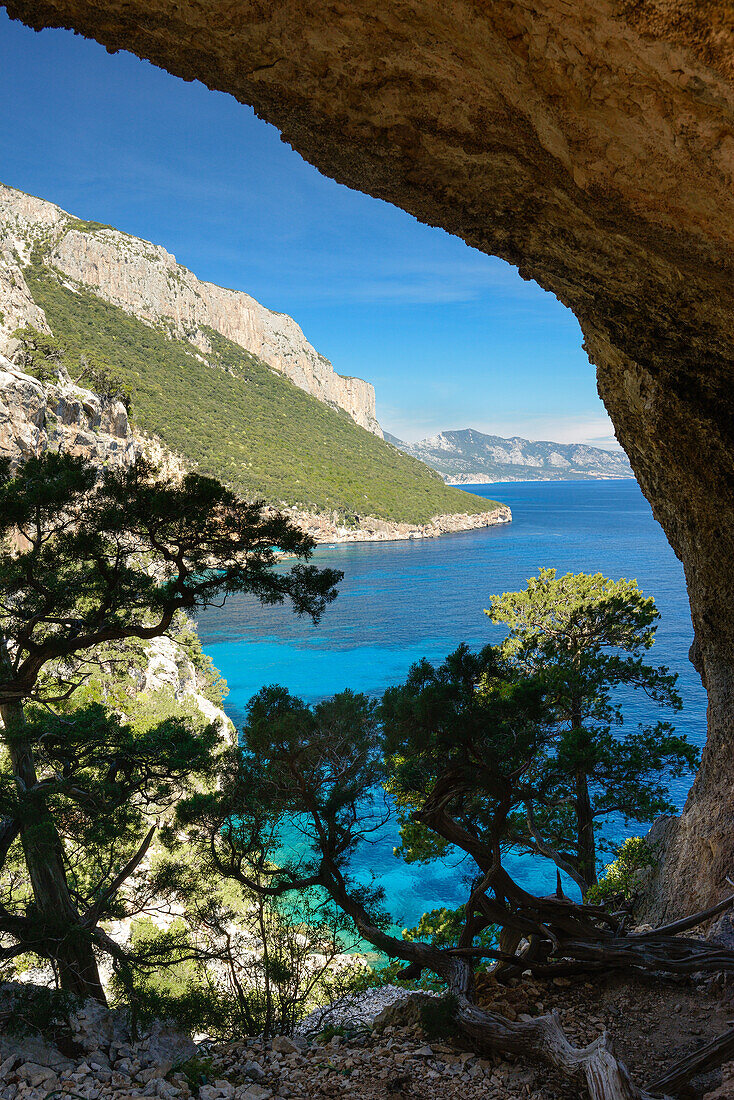 Rock arch Arcu su Feilau at the mountainous coast above the sea, Golfo di Orosei, Selvaggio Blu, Sardinia, Italy, Europe