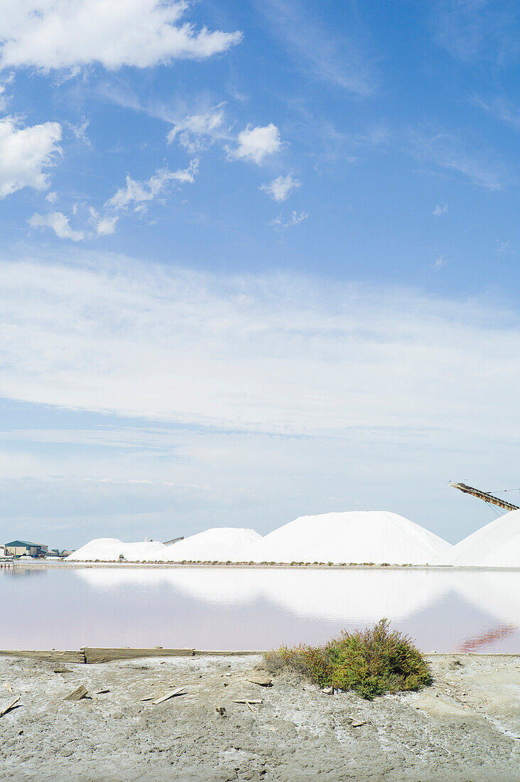 Salt mountains in the salt marshes, Aigues-Mortes, Camargue, Gard, Languedoc-Roussillon, France