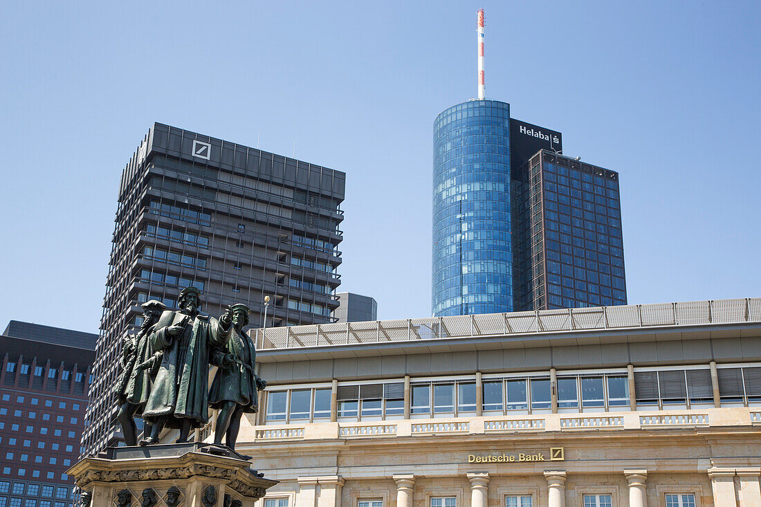 Statue beneath Financial district skyscrapers with Deutsche Bank building and Main Tower (Helaba), Frankfurt am Main, Hessen, Germany, Europe