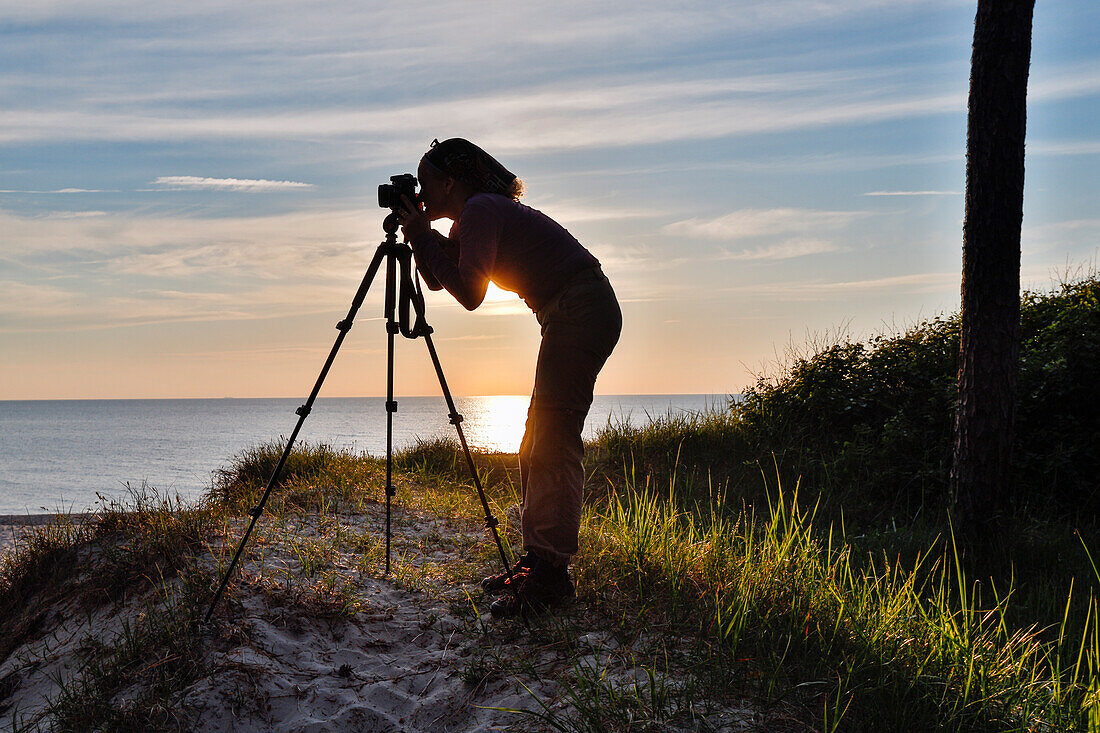 photographer at sunset, baltic coast, Darß, Mecklenburg-Vorpommern, Germany