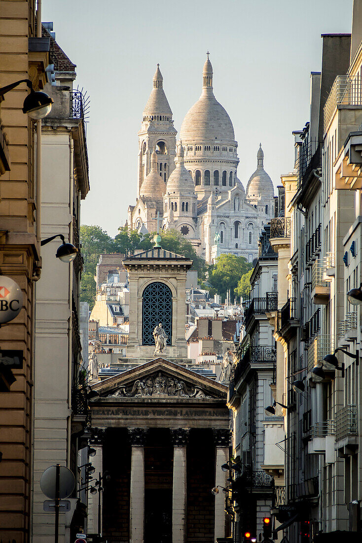 France, Paris, Montmartre, Sacré Cœur cathedral from rue Laffitte