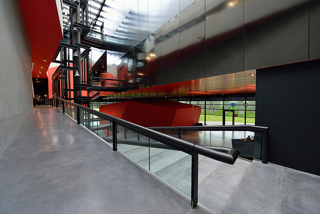 Europe,France, landing Frac Rennes. Red wall and modern metal structures (architect Odile Decq)