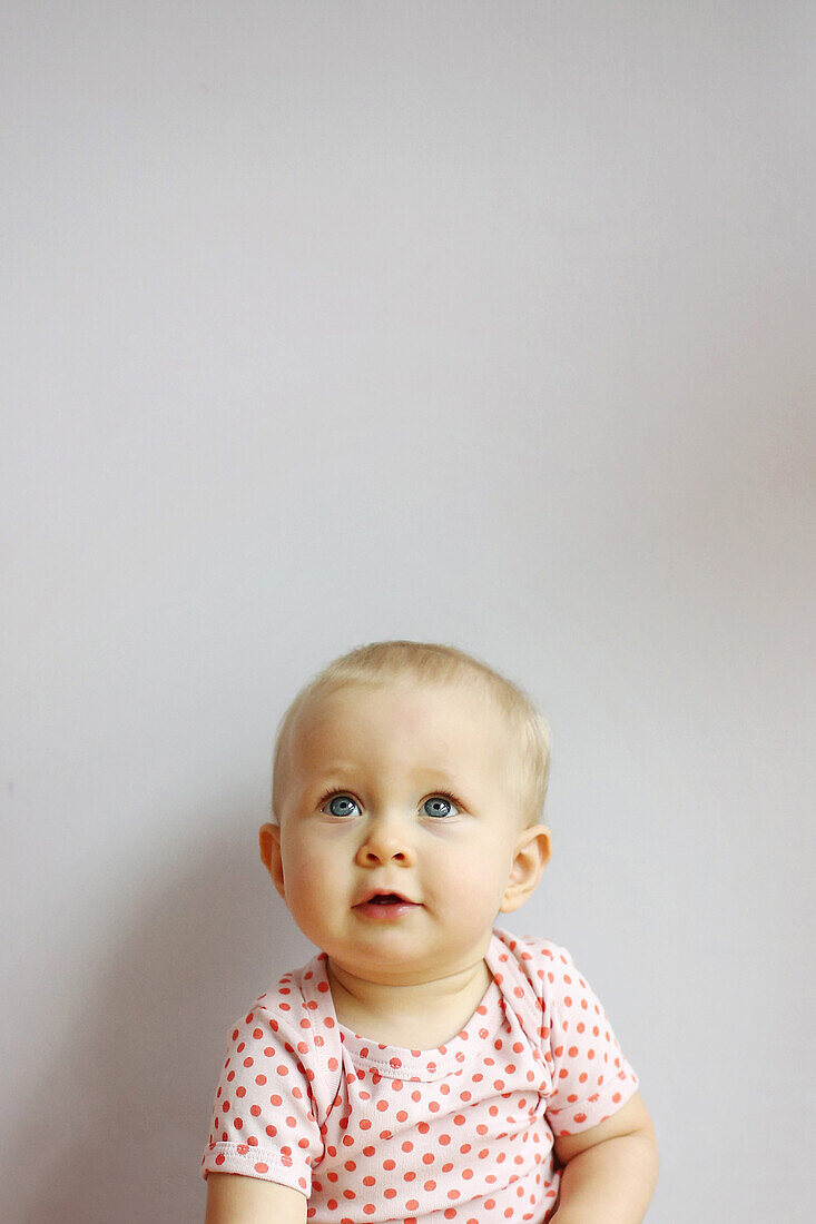 Portrait of a 1 year old baby girl