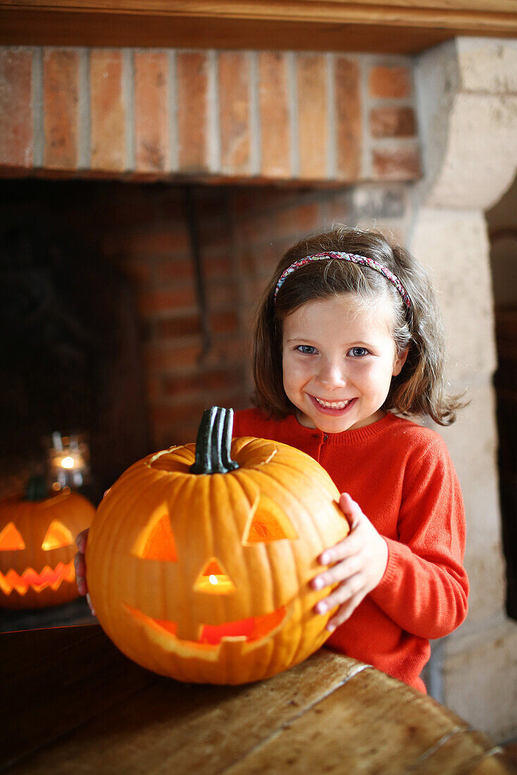 Little girl with a Jack-o-lantern