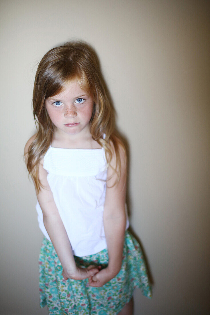 Portrait of a 5 years old girl pouting