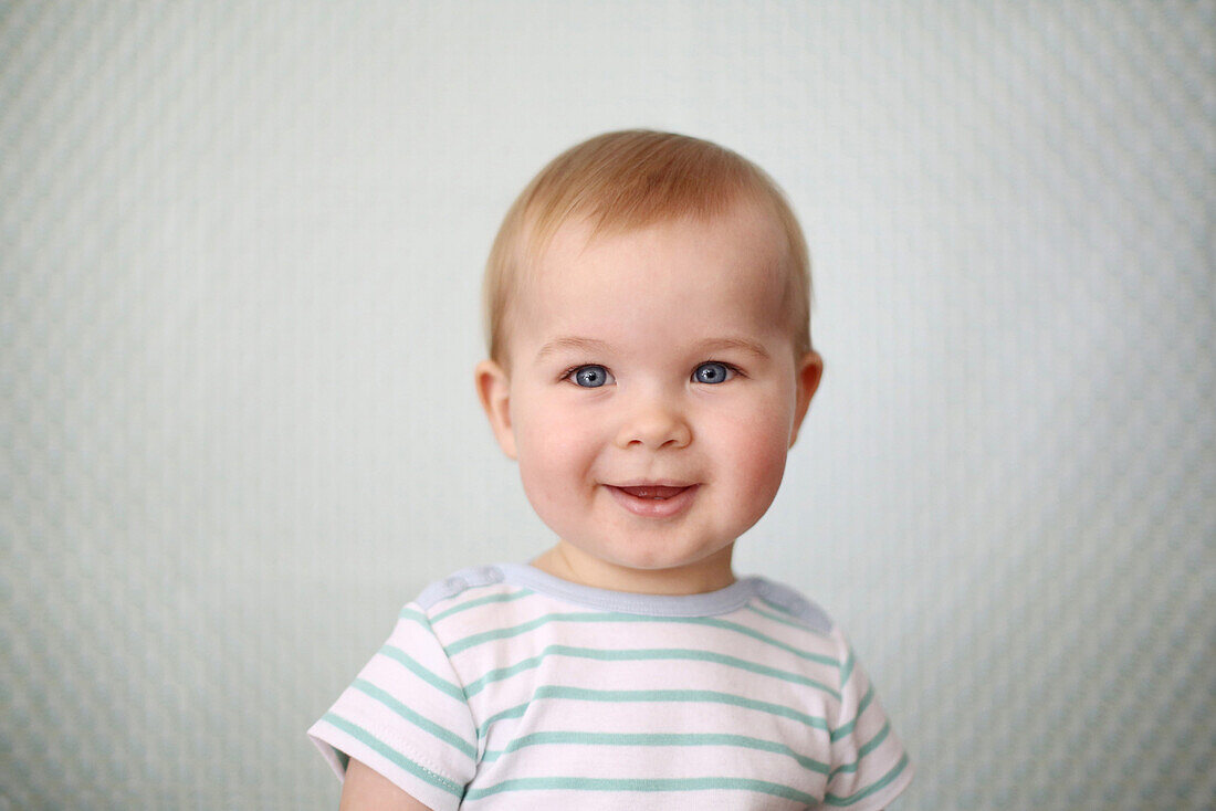 Portrait of a smiling 11 months baby boy