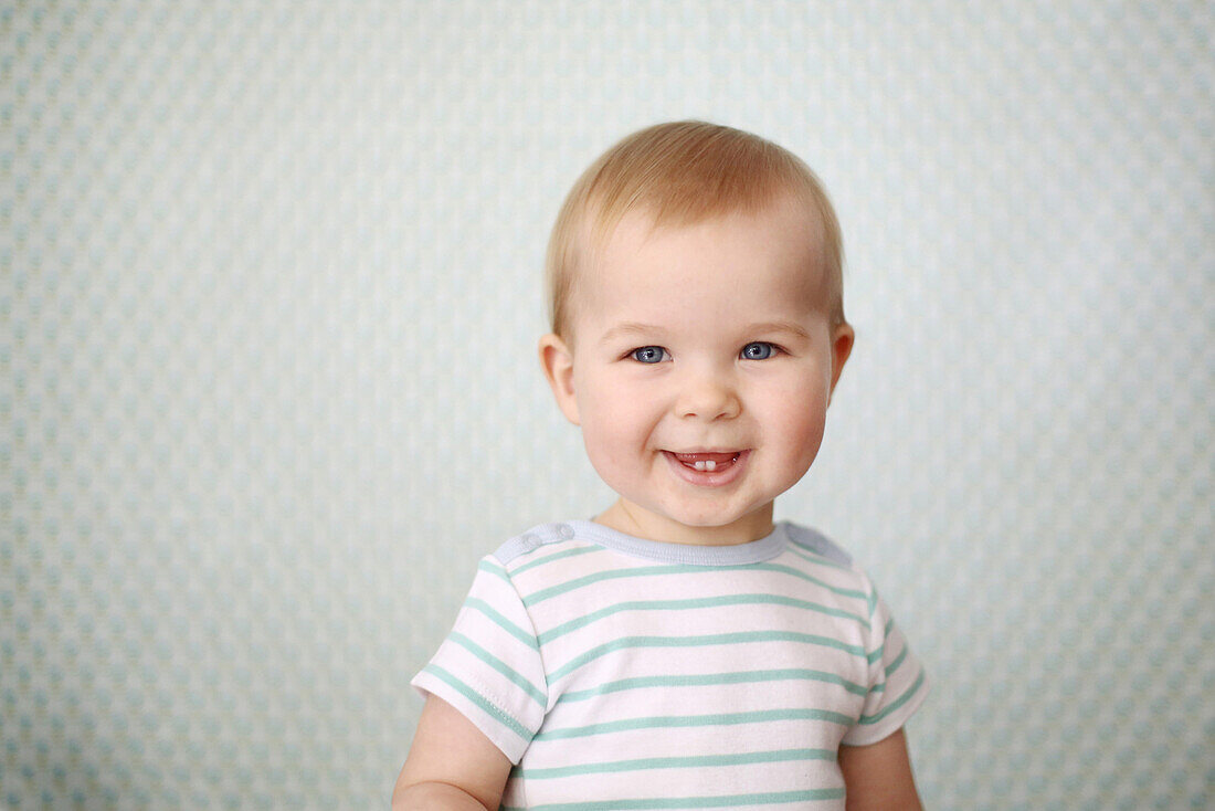 Portrait of a smiling 11 months baby boy