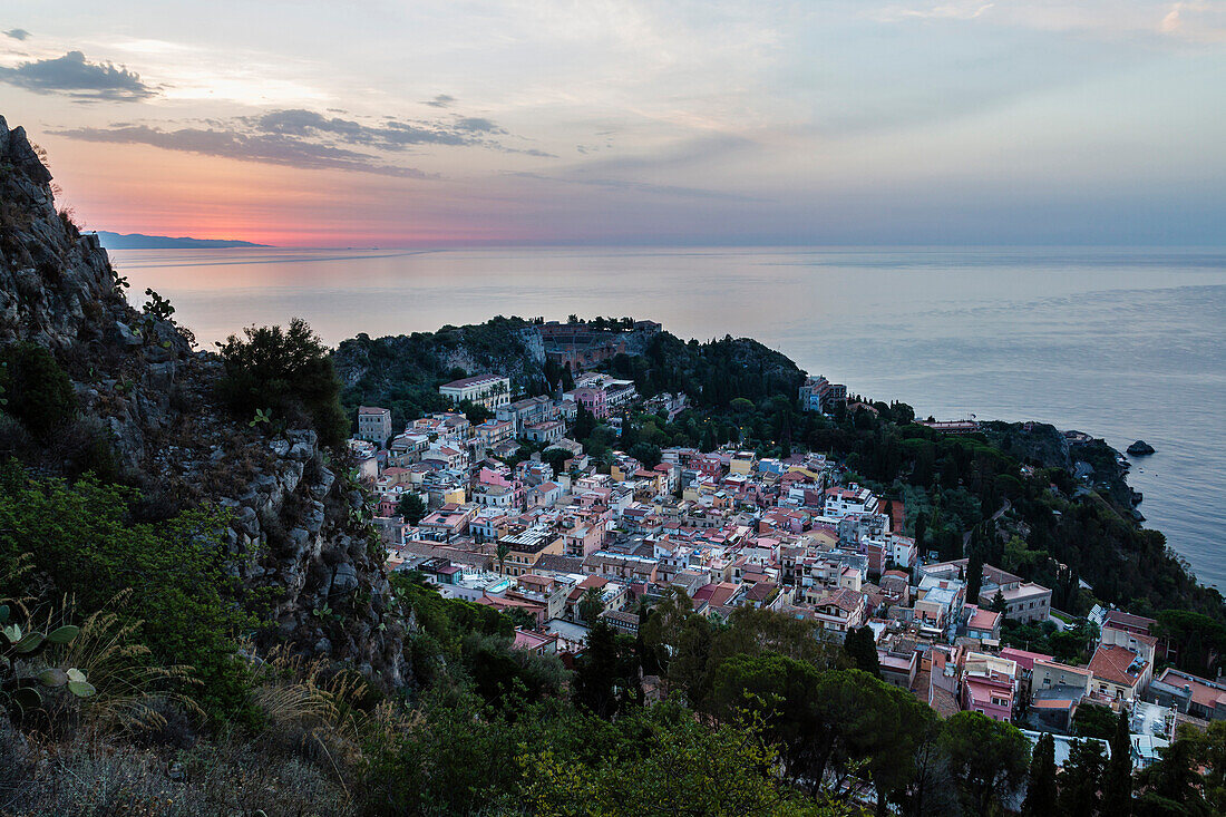 Aerial view of town at dawn, Taormina, Sicily, Italy