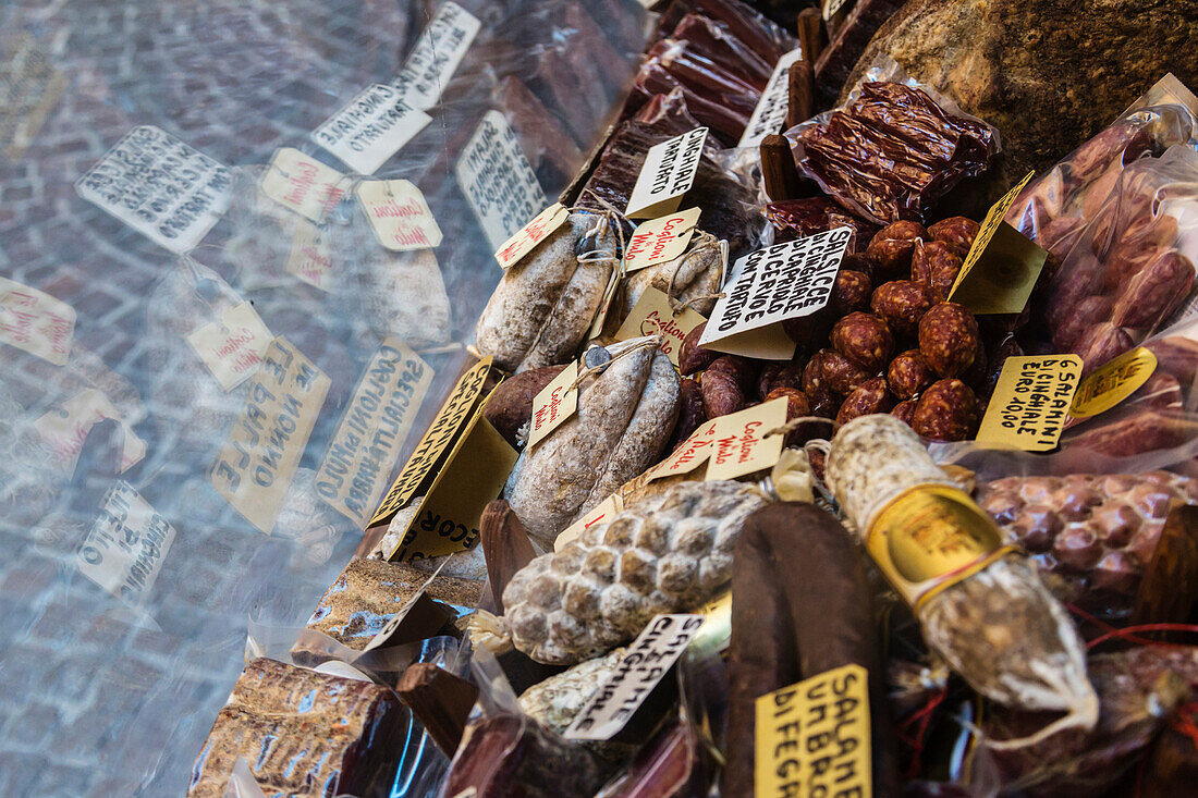 Dried meats on display at market, Orvieto, Umbria, Italy