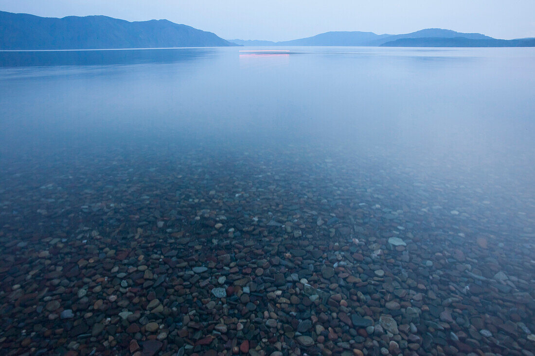 Rocks on bottom of still rural lake