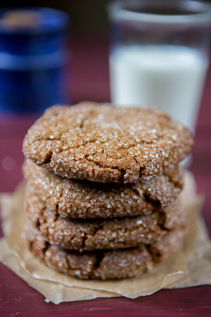 Stack of Soft Ginger Cookies With Glass of Milk