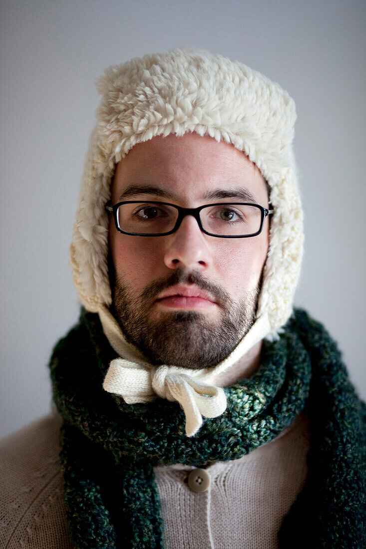 Man with Beard and Eyeglasses Wearing Hat and Scarf, Portrait, Close-Up