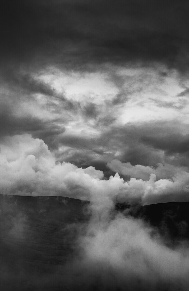 Ominous Clouds Over Hills