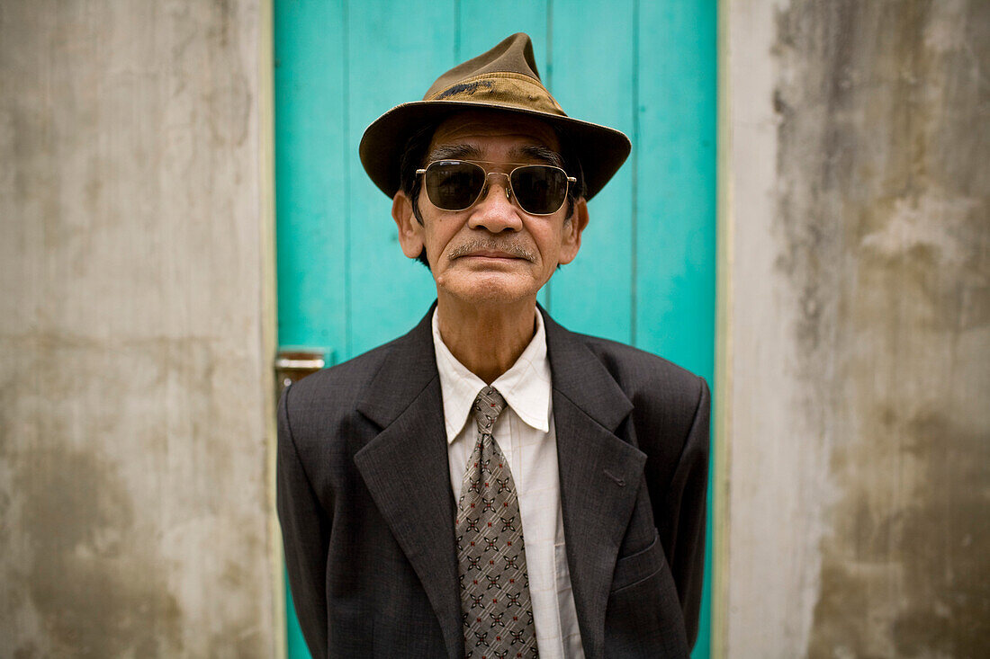 Vietnamese Man in Suit, Hat and Sunglasses