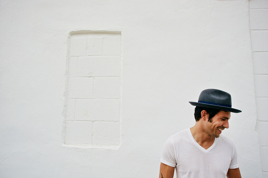Mixed race man wearing hat outdoors, Los Angeles, California, USA