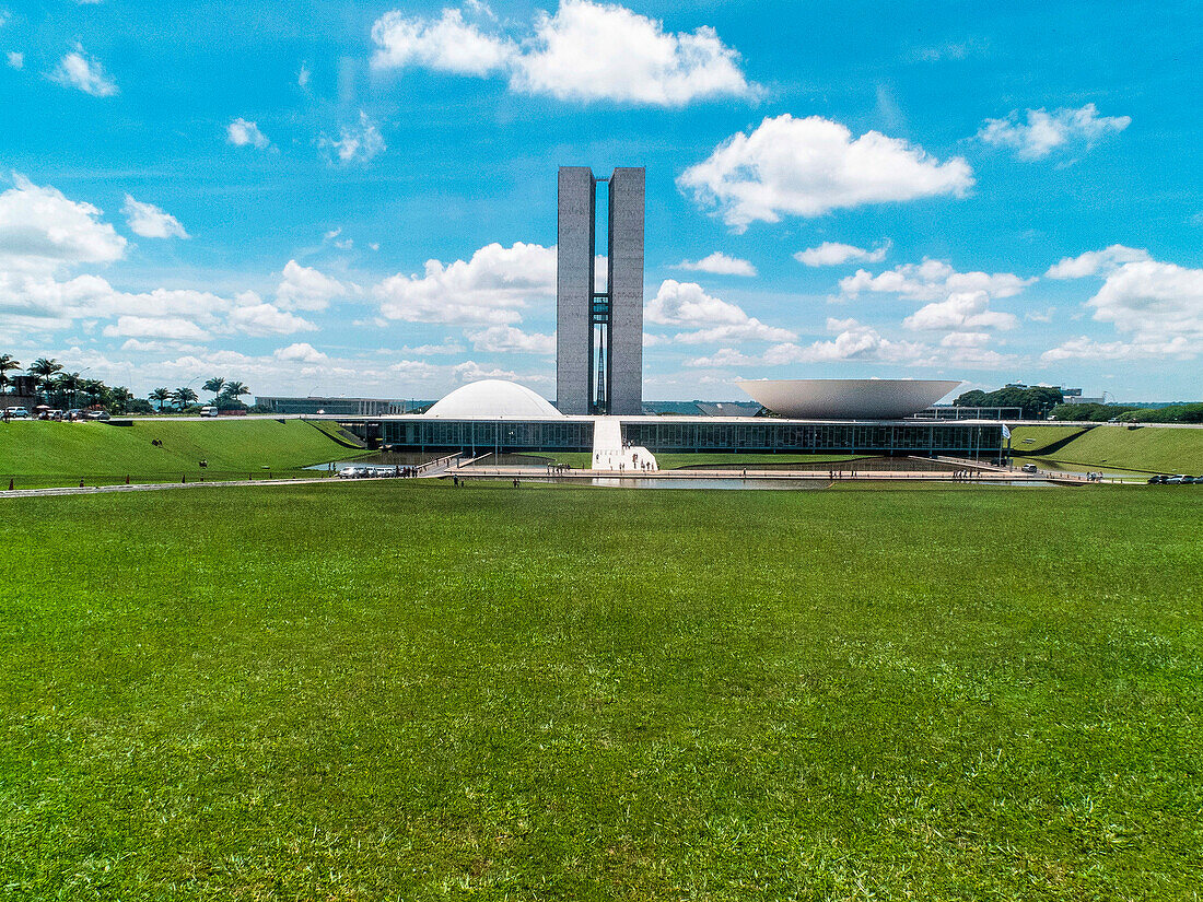 Brazil, Brasilia, National Congress of Brazil (architect: Oscar Niemeyer), grass in foreground