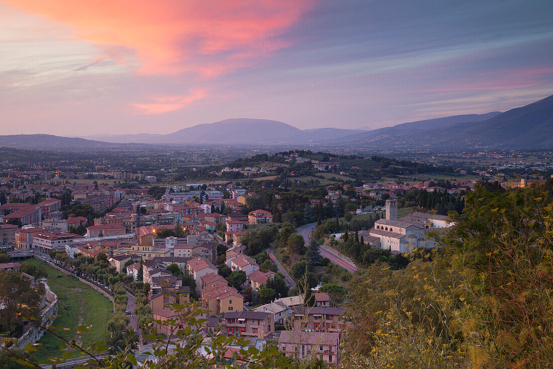 View of Church of St. Ponziano and Spoleto at sunset, Spoleto, Umbria, Italy, Europe