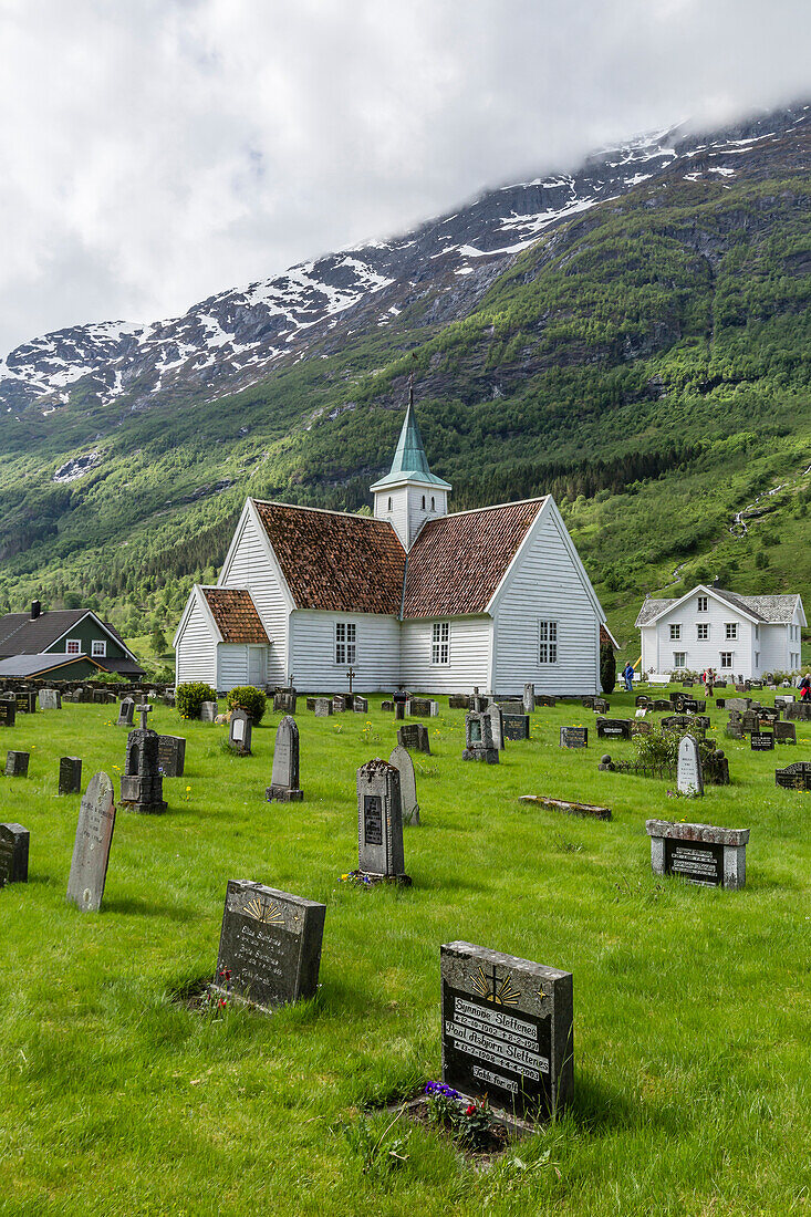 Cemetery in front of church in the town of Olden, Briksdalen, Nordfjord, Norway, Scandinavia, Europe