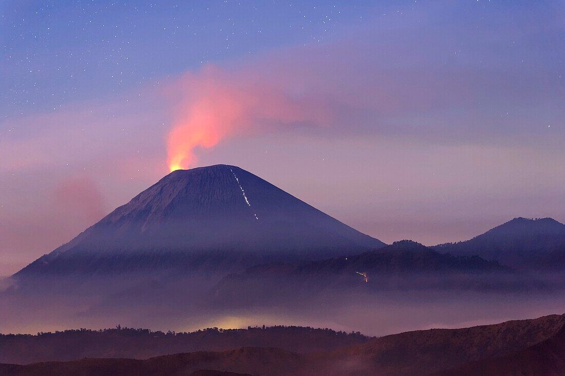 Active Gunung Bromo volcano at night, Bromo-Tengger-Semeru National Park, Java, Indonesia, Southeast Asia, Asia