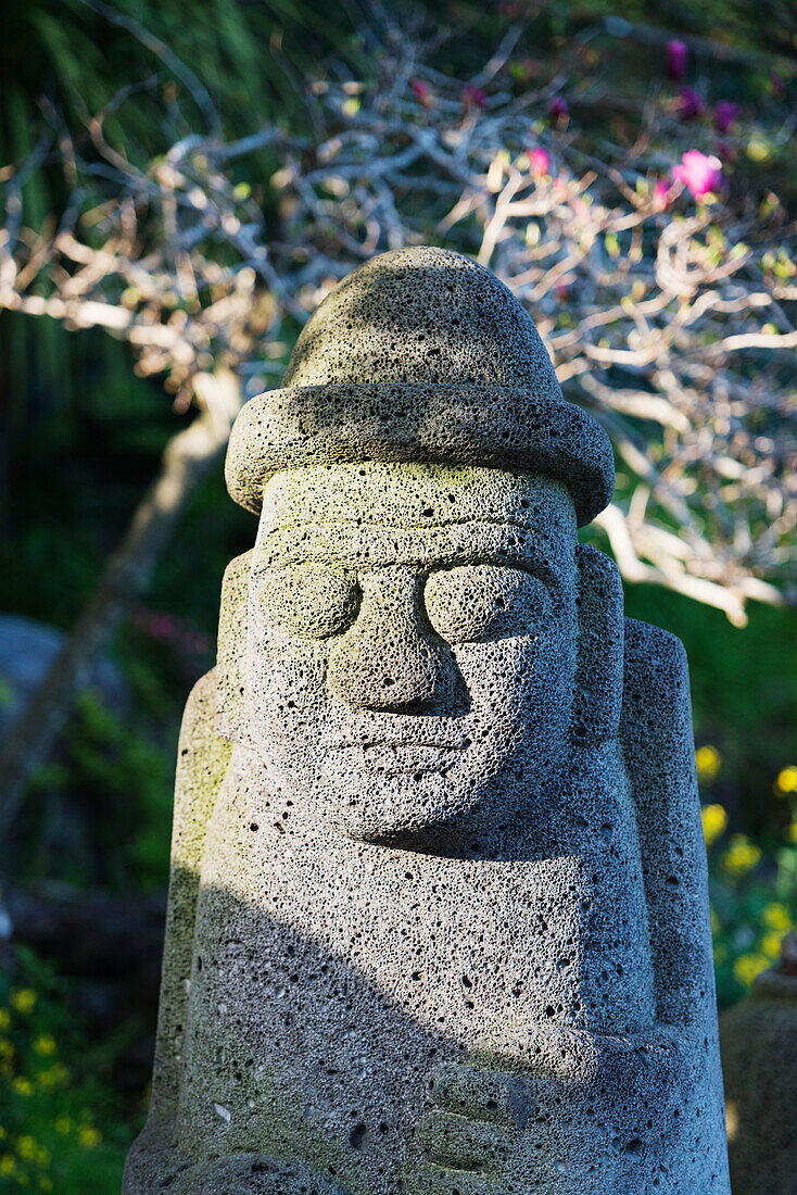 Dol hareubang (harubang) protection and fertility statue, Seogwipo City, Jeju Island, South Korea, Asia