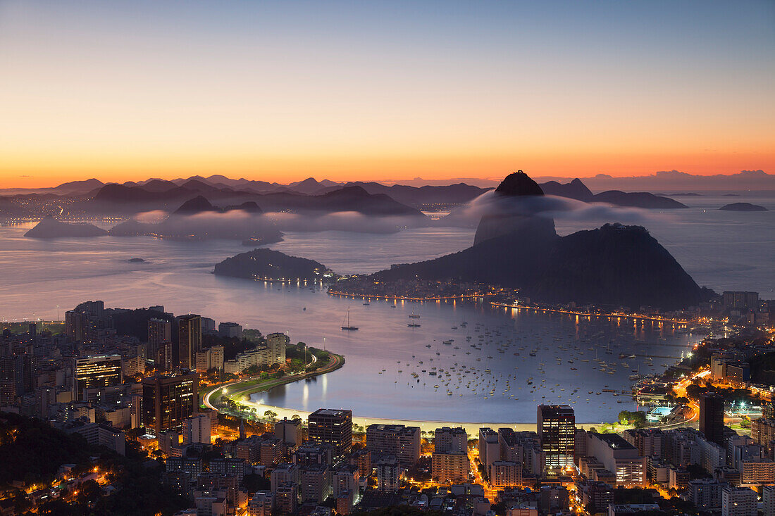 View of Sugarloaf Mountain and Botafogo Bay at dawn, Rio de Janeiro, Brazil, South America