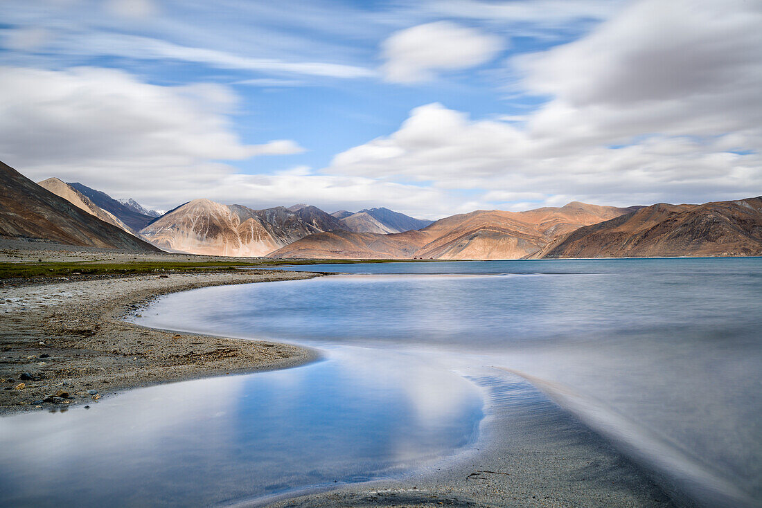 The turquoise, saline water of Tso Pangong, backed by mountains, Ladakh, India, Asia