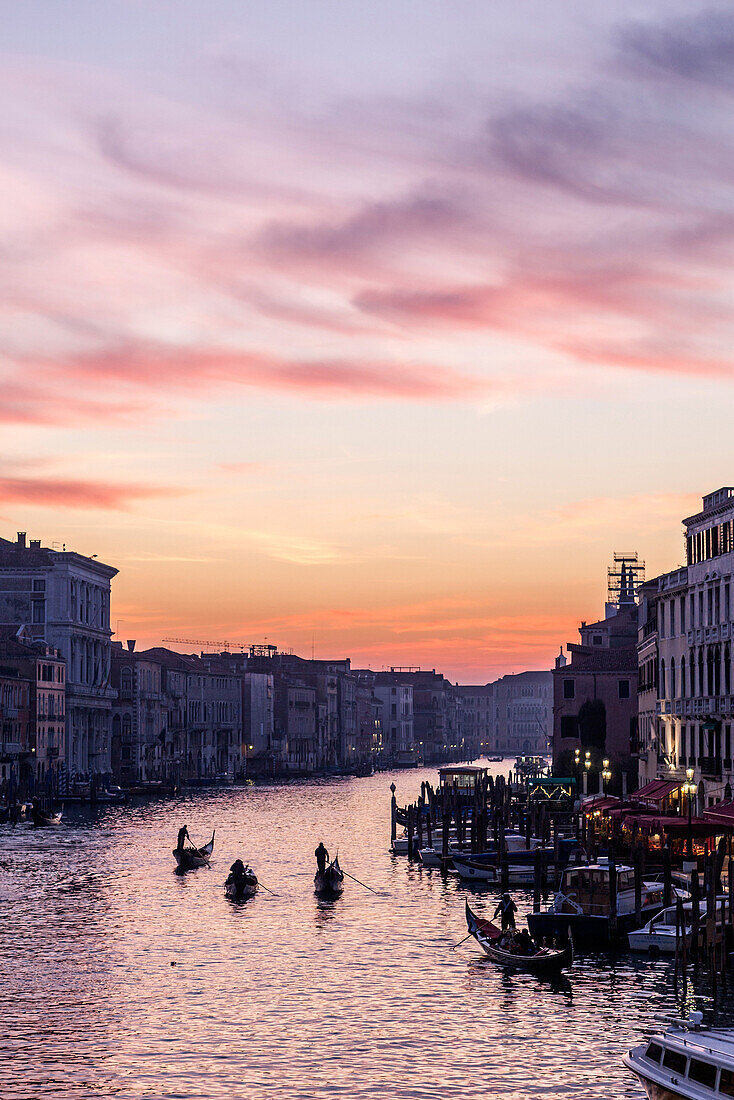The Grand Canal and gondolas at twilight, Venice, UNESCO World Heritage Site, Veneto, Italy, Europe