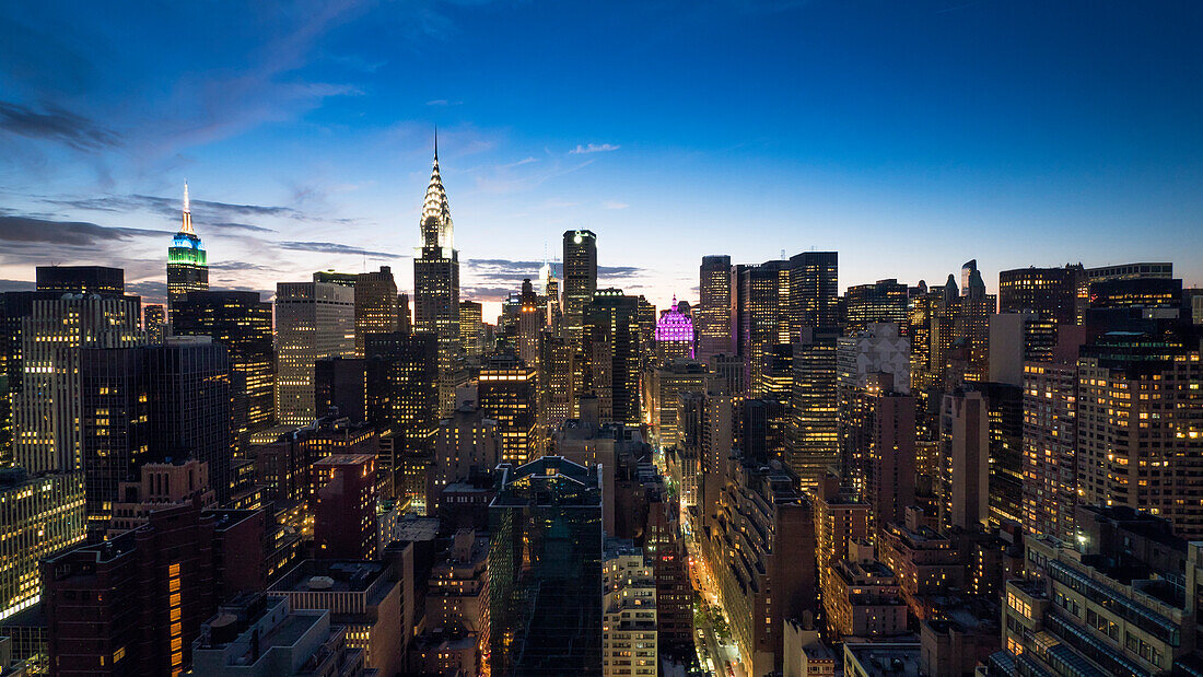 Manhattan skyline with the Chrysler Building and Empire State Building at dusk, New York, United States of America, North America
