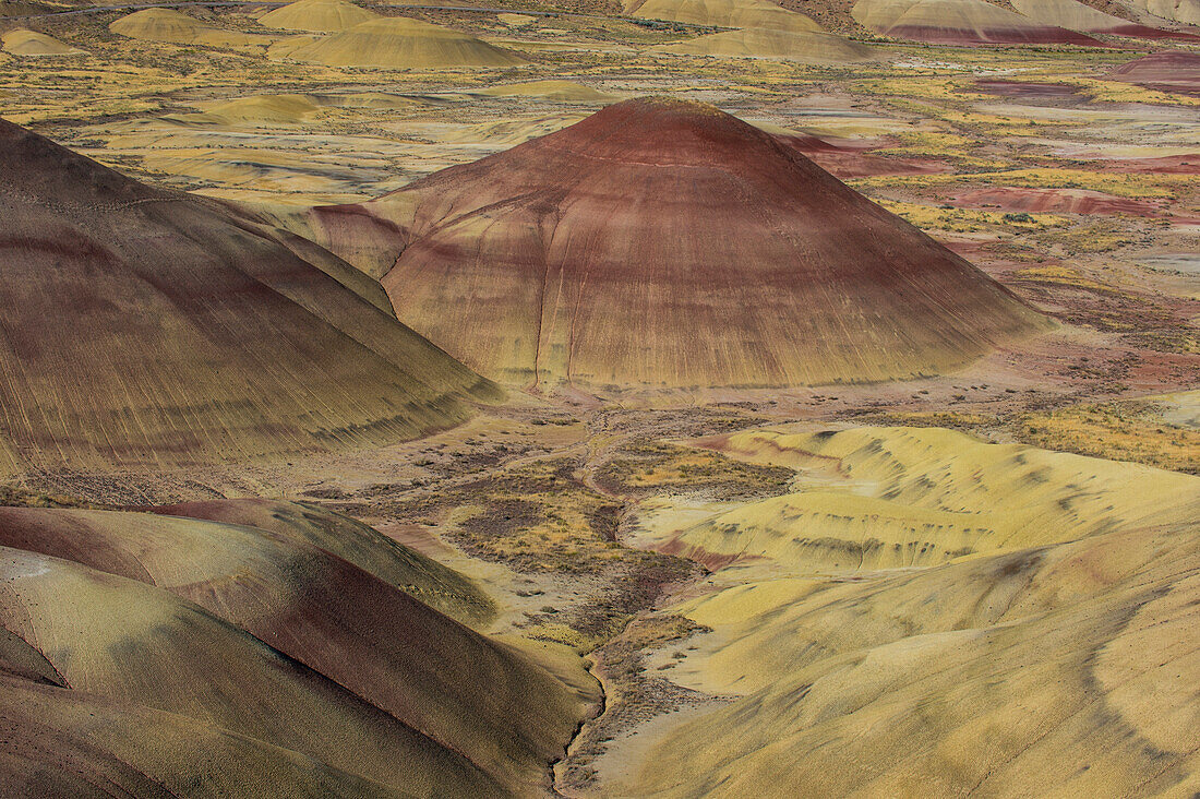 The colourful hills of the Painted Hills unit in the John Day Fossil Beds National Monument, Oregon, United States of America, North America