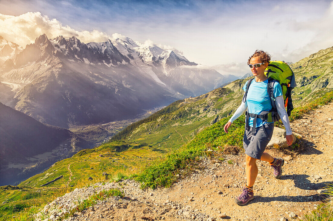 Roberta walks over Chamonix during the Tour of the Mont Blanc