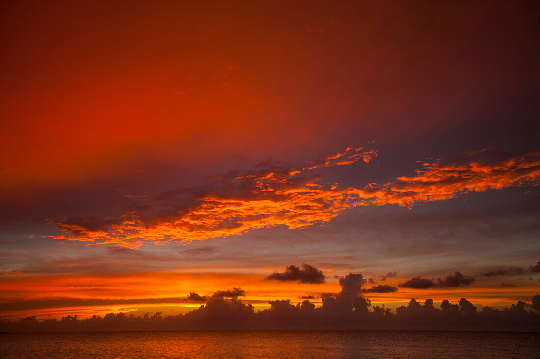 A beautiful sunset full of color as seen from  Playa La Jaula beach, Cayo Coco, Cuba